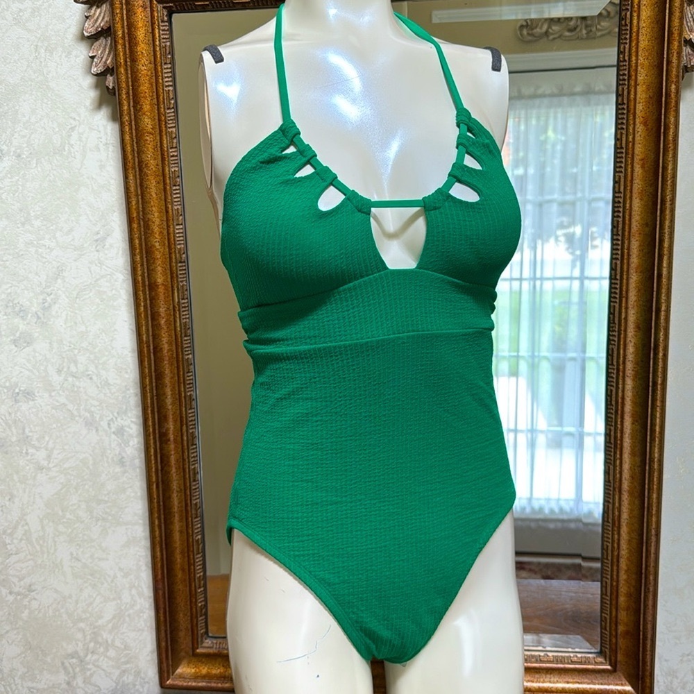 New without tag. BECCA Green Pucker Up Candace One Piece Swimsuit. Size L.